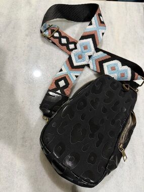 Black Leopard-Print Crossbody Bag with Patterned Strap